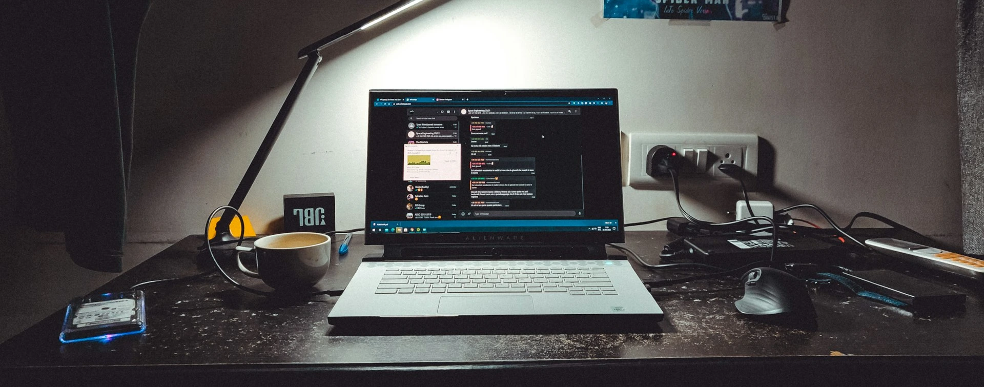 macbook pro on black table